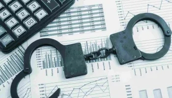 Handschellen auf Unternehmenszahlen für Wirtschaftskriminalität